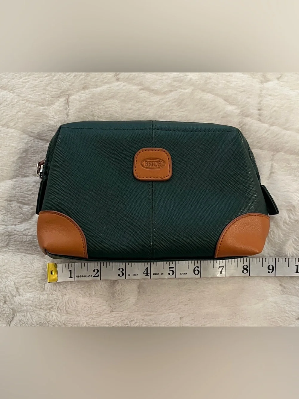 Bric's green faux-leather amenity kit bag. Unisex